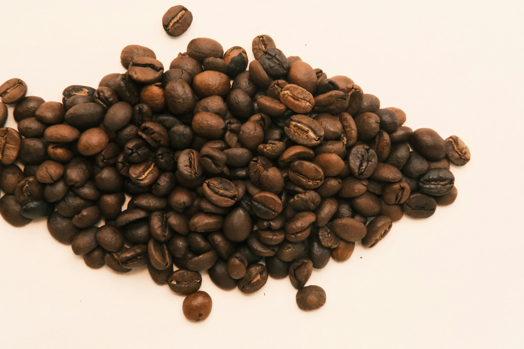 Dark-roasted whole coffee beans